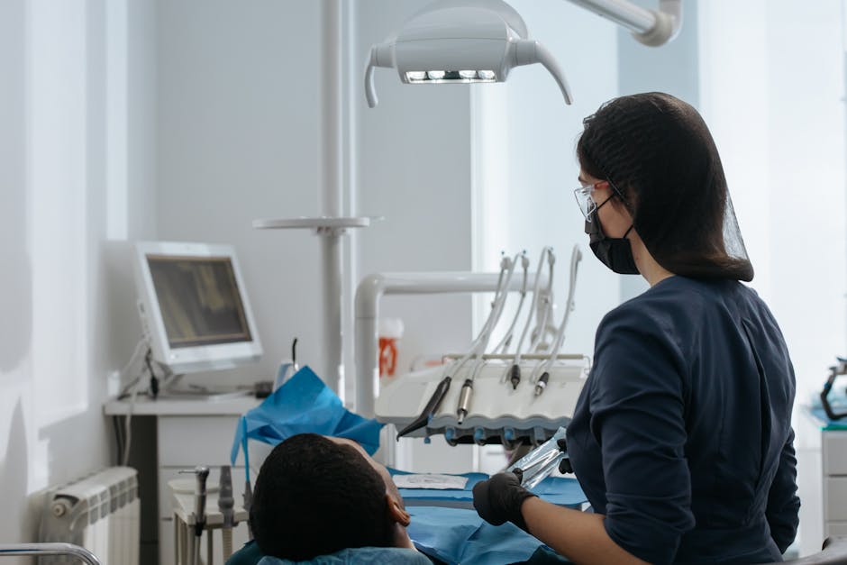 Dentist Treating Patient